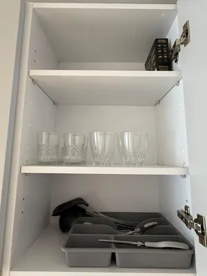 a cupboard with some glasses and bowls on it at Adresse exceptionnelle Casablanca in Casablanca