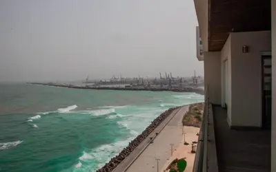 a view of the ocean from a building at Appartement entier 2 chambres marina avec vue panoramique mer in Casablanca