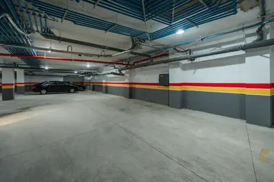 a parking garage with a car parked in it at Les Princesses studio, self check-in, parking in Casablanca