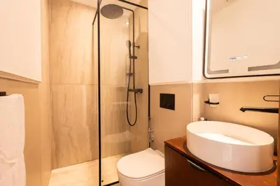 a bathroom with a toilet and a sink and a shower at Les Princesses studio, self check-in, parking in Casablanca