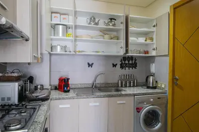 a kitchen with a sink and a washing machine at R101-6- Lovely and Spatious apartments in Belvedere near High Speed Train Station in Casablanca