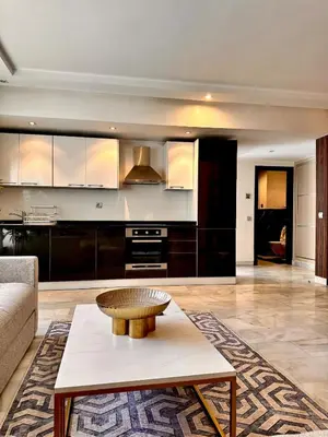 a living room with a couch and a coffee table at Cozy apartment near the sea in Casablanca