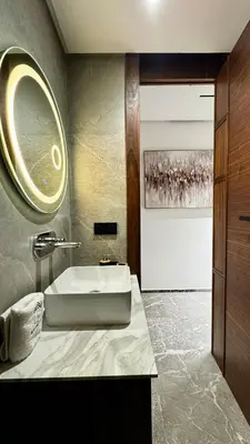 a bathroom with a sink and a mirror at Pool in the Sky - By AppartAli in Casablanca