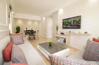 a living room with a couch and a table at Horizon Mogador home in Casablanca