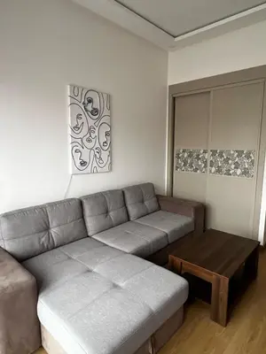 a living room with a couch and a coffee table at Évasion de luxe Tamaris in Tamaris