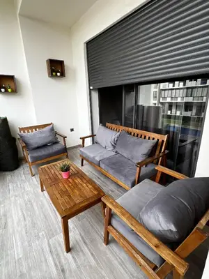 a living room with a couch and a table at Évasion de luxe Tamaris in Tamaris
