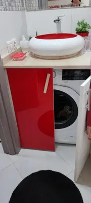 a washing machine with a lid on top of it at Al yakoute in Mansouria