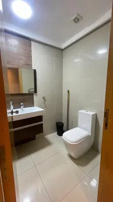 a bathroom with a toilet and a sink at Chic & secure in Casablanca