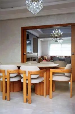 a dining room with a table and chairs at Villa 130 Spacieuse 4 chambres dar bouazza proche plage in Casablanca