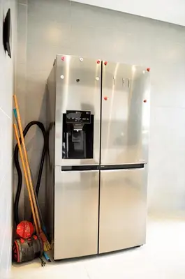a refrigerator with a coffee maker in a kitchen at Villa 130 Spacieuse 4 chambres dar bouazza proche plage in Casablanca