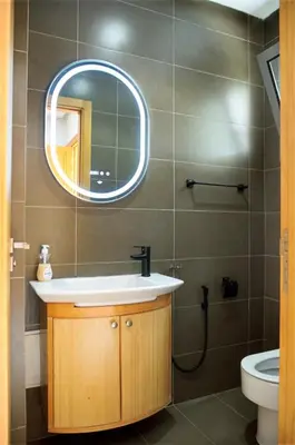 a bathroom with a sink and a mirror at Villa 130 Spacieuse 4 chambres dar bouazza proche plage in Casablanca