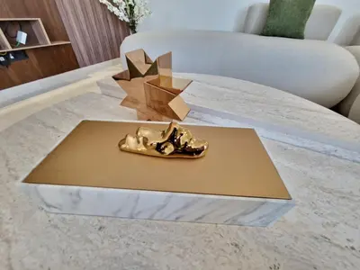 a gold object sitting on top of a table at Cosy stylé et confortable in Casablanca