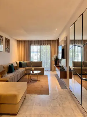 a living room with a couch and a table at Central 2 bedrooms in Casablanca in Casablanca