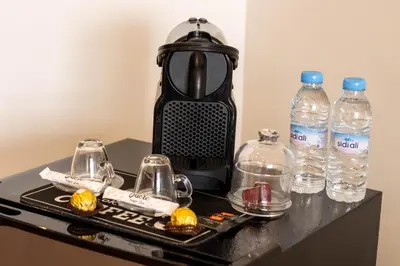 a black table with bottles of water on it at Panorama sur l'infini in Casablanca