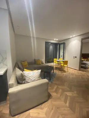 a living room with a couch and a table at The Quiet House in Casablanca