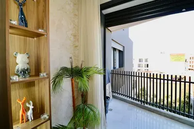 a room with a hallway with a staircase and a room with at Luxurious and modern studio on Maarif-Franceville in Casablanca