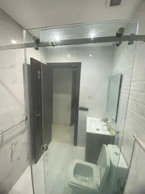 a bathroom with a toilet and a sink at The White House in Casablanca