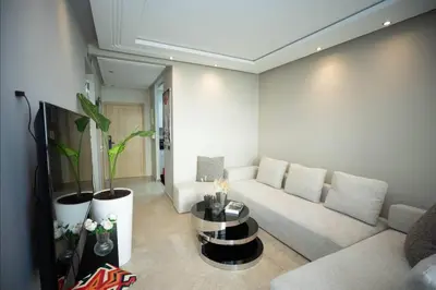 a living room with a couch and a table at Where to stay in Casablanca 2 bedrooms in Casablanca