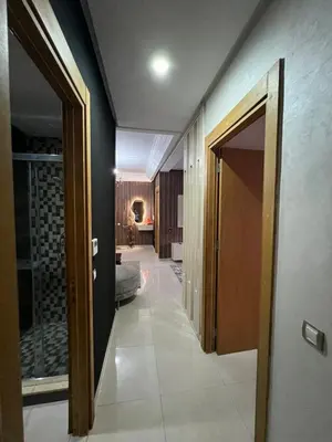a hallway with a door open to a room at Apartment in a residence in Pont Blondin