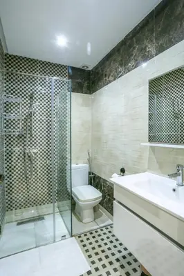 a bathroom with a toilet and a sink and a shower at Terrasse au Soleil, Confort in Bouskoura
