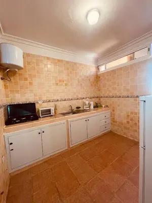 a kitchen with a sink and a microwave at Attractive Studio in Casablanca in Casablanca