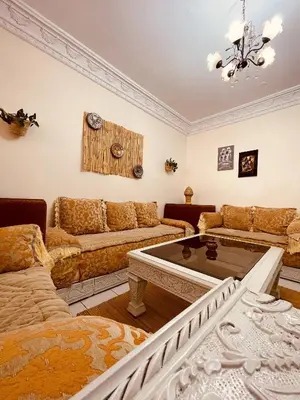 a living room with a couch and a table at Attractive Studio in Casablanca in Casablanca