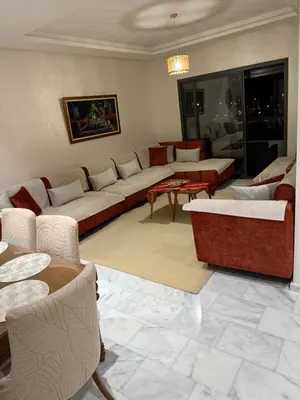a large living room with couches and a table at Zen garden by sea in Aïn Harrouda