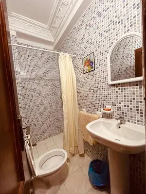 a bathroom with a toilet and a sink at Beautiful Studio in Casablanca in Casablanca