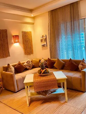 a living room with a couch and a table at Havre de Paix in Casablanca in Casablanca