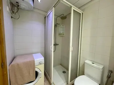 a bathroom with a shower and a toilet at Rihla Stays - Anfa City in Casablanca