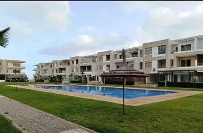 an image of a building with a swimming pool at Sunset Malaga beach house in Mansouria