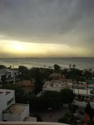 a view of a city with the ocean in the background at M'ocean Sea View Apartment by 7AV Hotels in Mohammedia