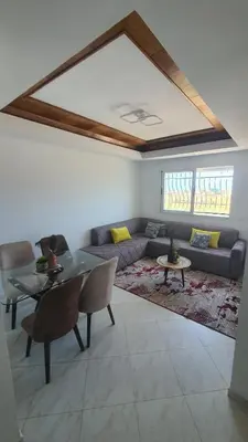 a living room with a couch and a table at Ocean View Tamaris in Tamaris