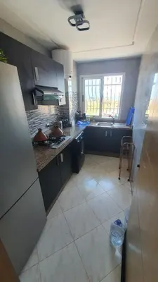 a kitchen with a sink and a counter top at Ocean View Tamaris in Tamaris