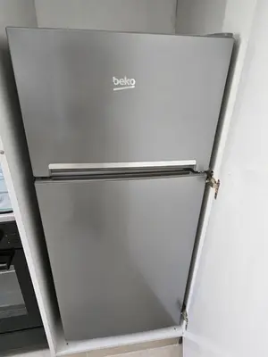a refrigerator with the door open in a kitchen at Apartamento Bonito in Rabat