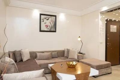 a living room with a couch and a table at Anfa Dream in Casablanca