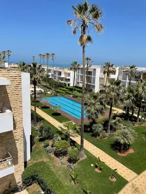 an aerial view of a resort with a swimming pool at L'Eden - 2 BR - Beachfront & Pool - 3 beds in Tamaris