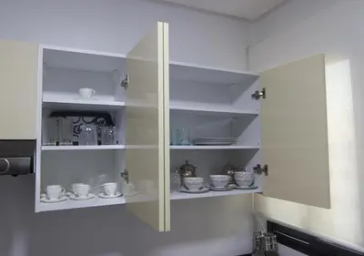 a white cabinet with cups and dishes in it at R102-3-4 Amazing apartments in Belvedere with Breathtaking Ocean and Street Views in Casablanca