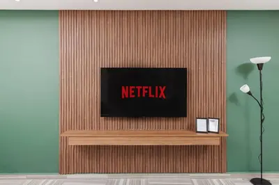 a television on top of a wooden wall at 3BR Modern Stay in Heart of Rabat in Rabat