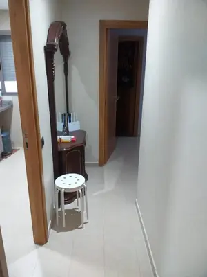 a hallway with a desk and a stool in a room at Blanca beach in Casablanca
