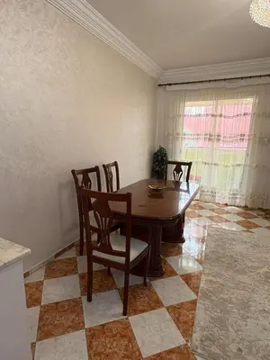 a dining room with a table and chairs at 2 Bedroom APT Near downtown - Perfect Location in Casablanca