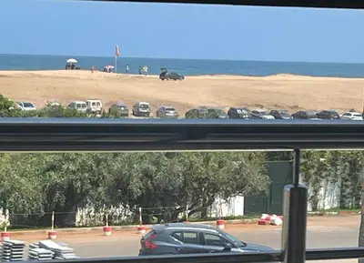 a bunch of cars parked in a parking lot at Villa oued cherrat bouznika 3 bedrooms in Bouznika