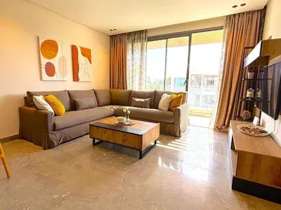 a living room with a couch and a coffee table at Casa Tina in Casablanca