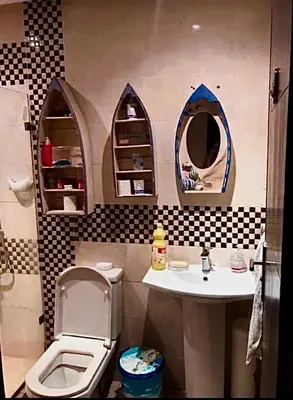 a bathroom with a toilet and a sink and mirror at Appart avec piscine in Pont Blondin