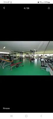 a large building with a gym with planes on display at Unité dans un complexe prestigieux Marina Golf in Settat