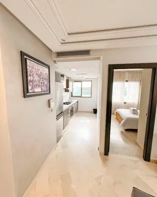 a large room with a bedroom and a bed at Stylish 1BR in Racine - Prime Racine Location in Casablanca
