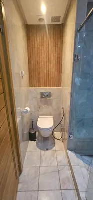 a bathroom with a toilet and a glass shower at Casablanca in Casablanca