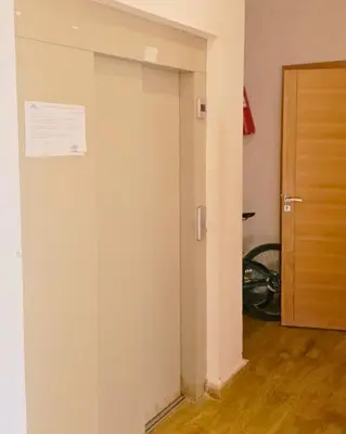 an open door with a paper on the wall at Perfect Family Apartment in Tamaris