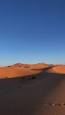 a sand dune in the middle of a desert at KHaIMA