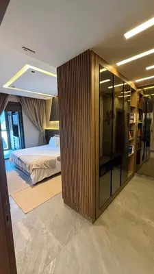 a bedroom with a bed and a glass wall at The Bleu waves in Casablanca
